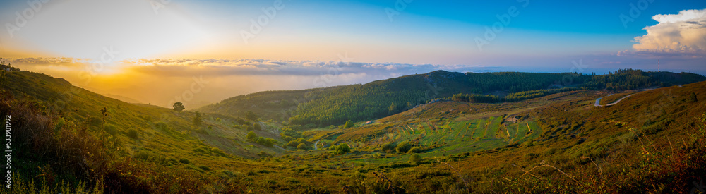 Fototapeta premium Panorama of Serra de Monchique, view over the nature of inland Algarve at Foia sunset