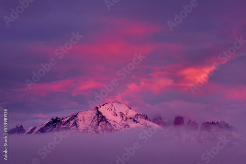 Winter twilight lanscape from Patagonia moutains with snow. Lago Nordenskjold, Torres del Paine National Park, Chile. Pink blue evening sky. Traveling in Chile,  hills in Torres del Paine NP. © ondrejprosicky