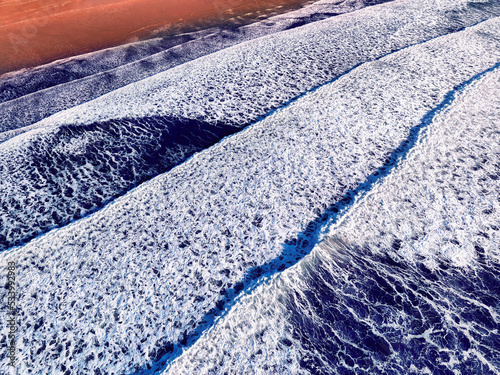 Waves at the Rhosilli Bay Beach in Wales photo