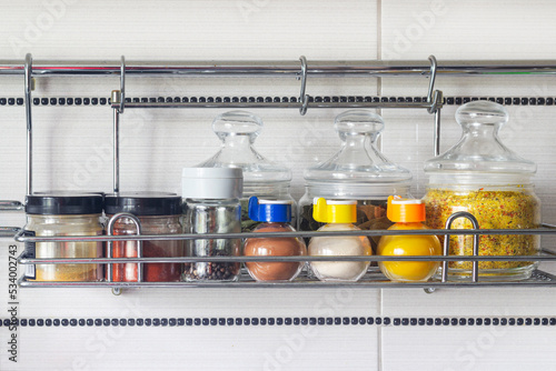 shelf with spices in the kitchen close-up photo