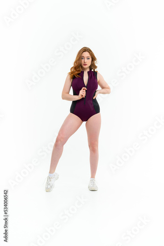 model size posing bodysuit on white background