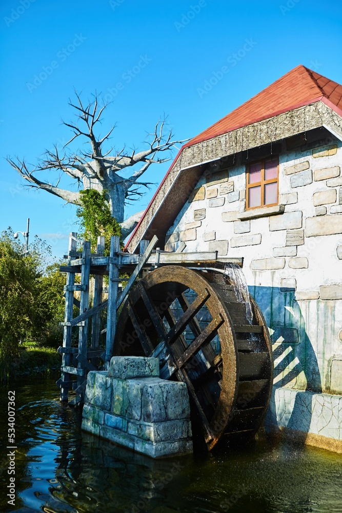 An old wooden water wheel. Medieval technology.