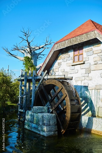 An old wooden water wheel. Medieval technology. © Fotoproff