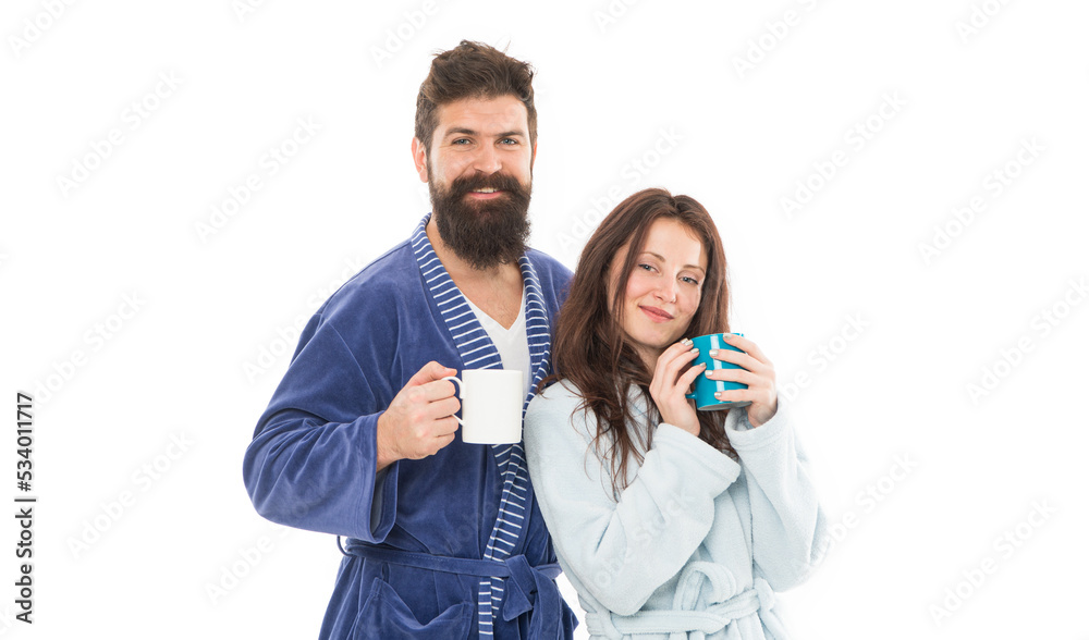 What a great morning. everyday routine. good morning coffee. happy family drink tea. couple in love wear bathrobe. Couple enjoy lazy weekend and drink coffee. man and woman need relax and energy What a great morning. everyday routine. good morning coffee. happy family drink tea. couple in love wear bathrobe. Couple enjoy lazy weekend and drink coffee. man and woman need relax and energy