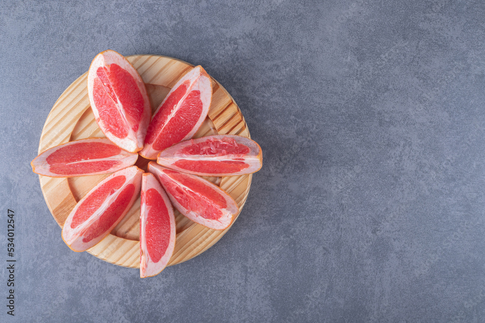 Top view. Pile of fresh organic grapefruit slices
