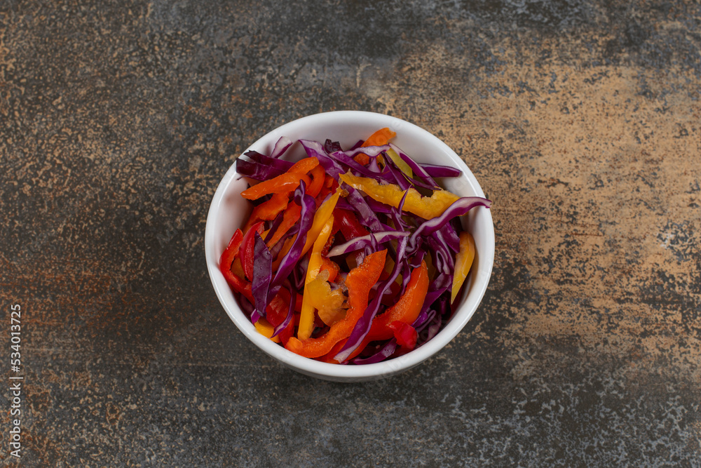 Various sliced vegetables in white bowl Various sliced vegetables in white bowl