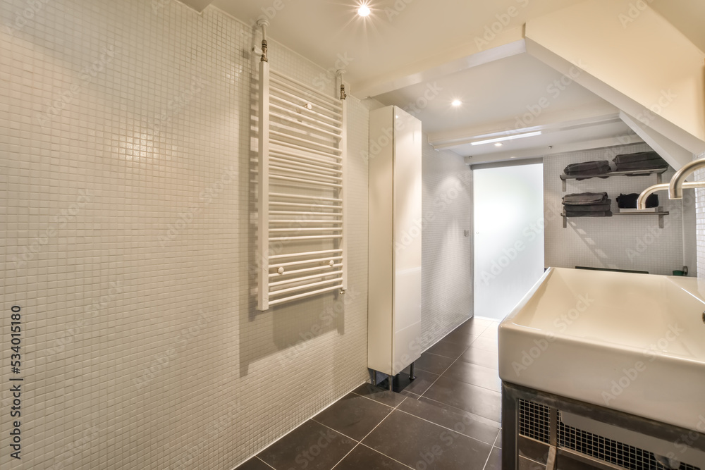 Bathroom with sink and heated towel rails Bathroom with sink and heated towel rails