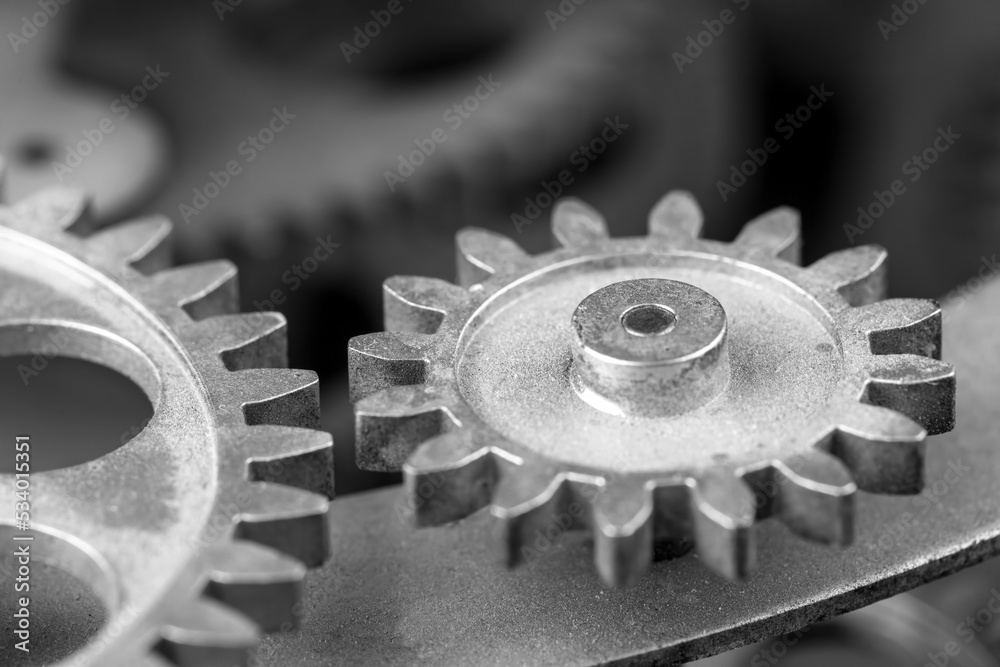 Close view of old clock mechanism with gears and cogs. Conceptual photo for your successful business design. Copy space included. Close view of old clock mechanism with gears and cogs. Conceptual photo for your successful business design. Copy space included.