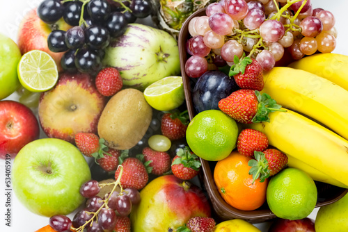Fototapeta Naklejka Na Ścianę i Meble -  Fresh mixed fruits.Fruits background.Healthy eating, dieting.Love fruits, clean eating.