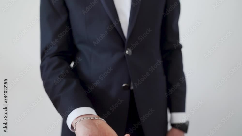 Groom throws up and holding wedding rings close up several times. Slow motion Groom throws up and holding wedding rings close up several times. Slow motion