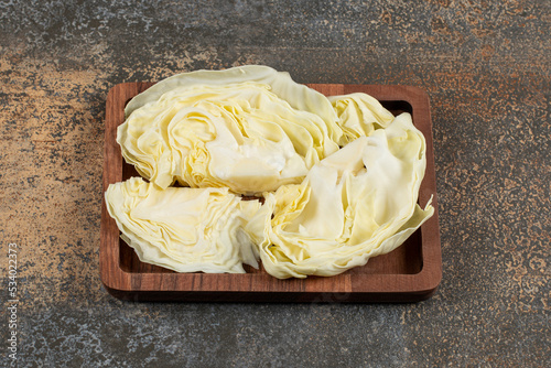A tray of ripe cabbage, on the marble background