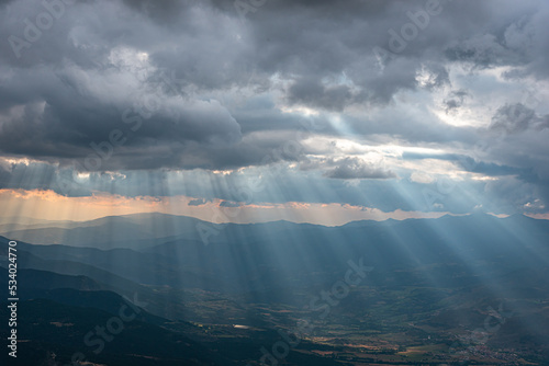 Rays of light passing through the clouds