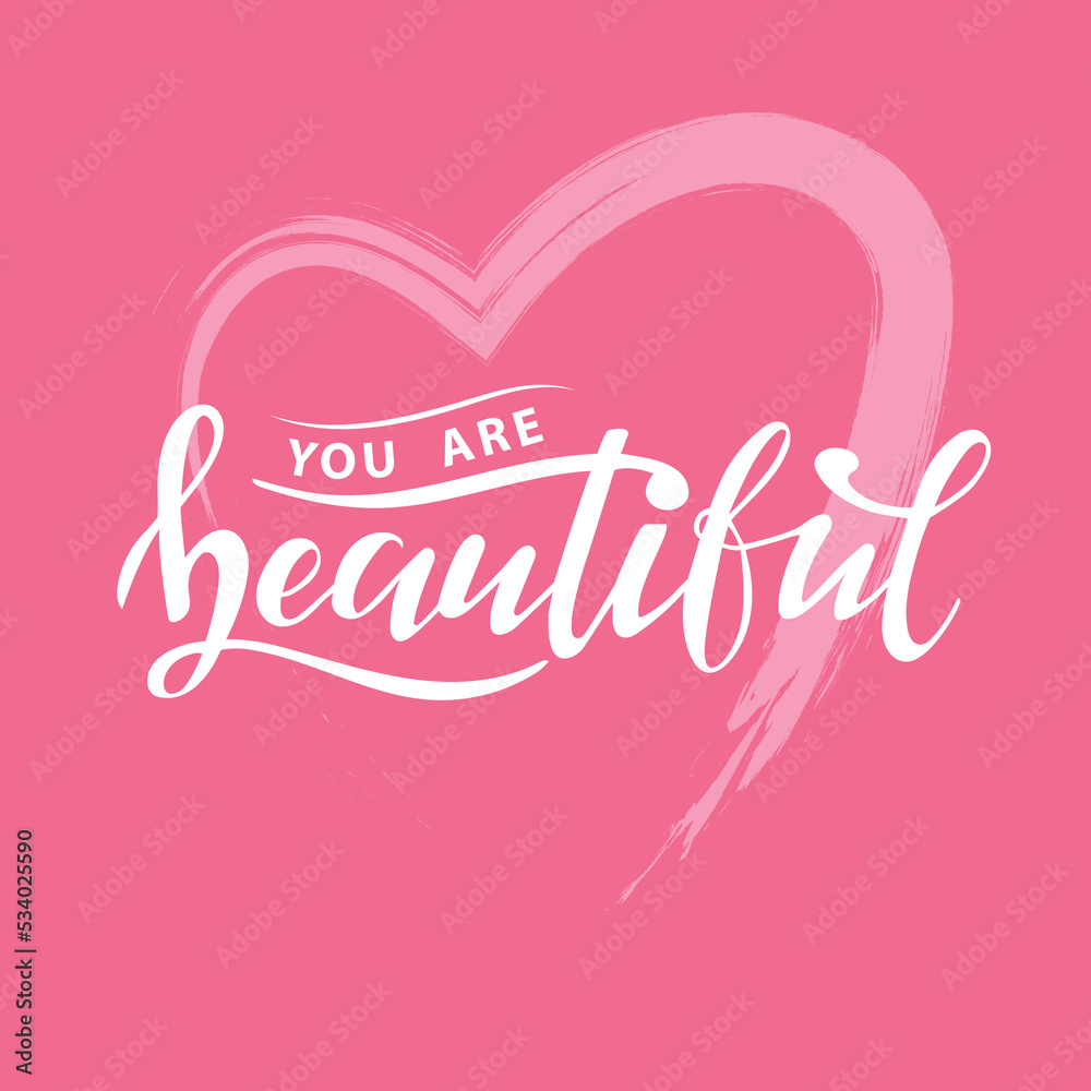 You are beautiful. Digital hand lettering.  white letters on the pink textured heart. Women's trendy calligraphy. Stylish gentle illustration. Fashion magazine cover. Innuendo color. Logo. 