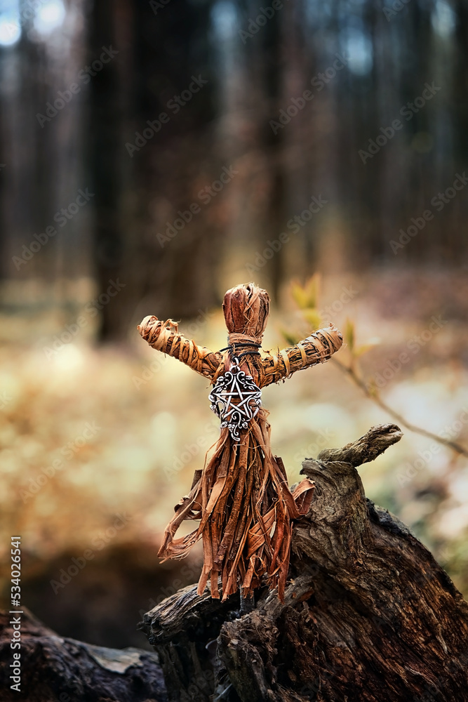 magic witchcraft doll made of tree bast in forest natural background. Forest grandmother, defender guardian spirit of nature. ancient pagan, Wiccan, Slavic traditions. esoteric spiritual ritual