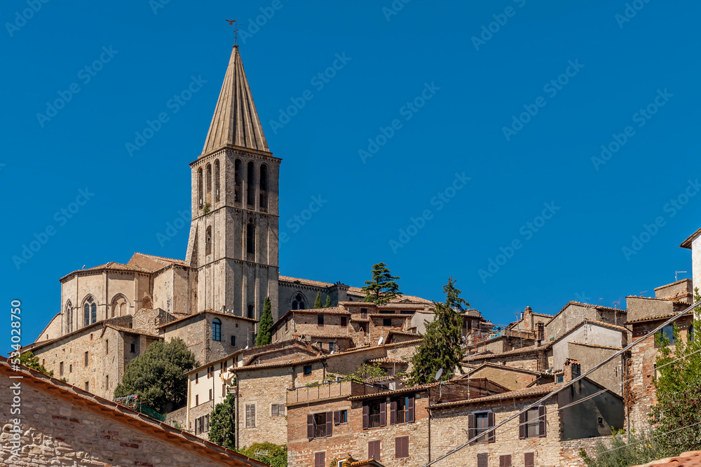 The bell tower of the church of San Fortunato dominates the historic center of Todi, Perugia, Italy from above