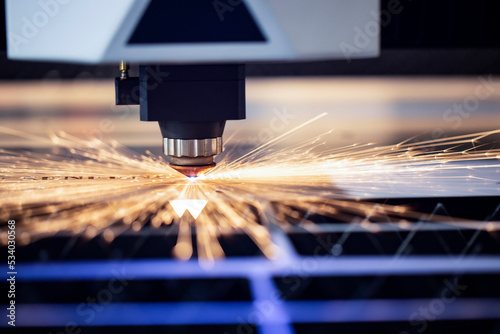 Cnc milling machine. Processing and laser cutting for metal in the industrial. Motion blur. Industrial exhibition of machine tools.