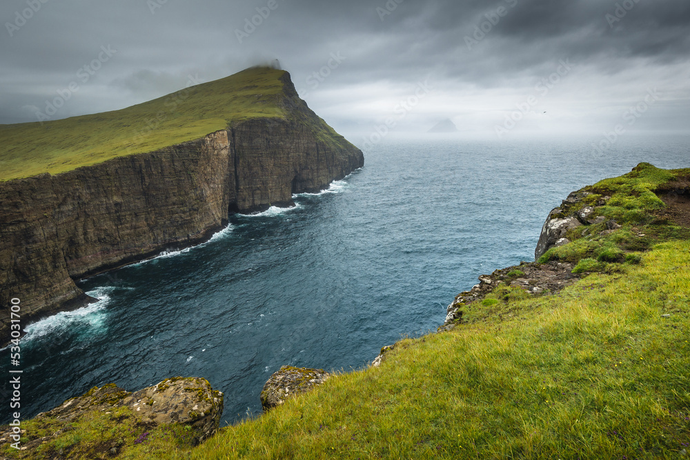 Amazing landscapes of the Faroe Islands captured in summer. Views of the island of Vagar Amazing landscapes of the Faroe Islands captured in summer. Views of the island of Vagar
