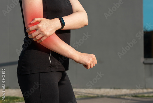 Photography Elbow pain, sport trauma of woman athlete