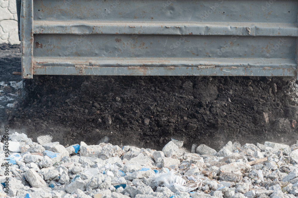 Obraz premium truck body pours asphalt, gravel, dump truck, industry