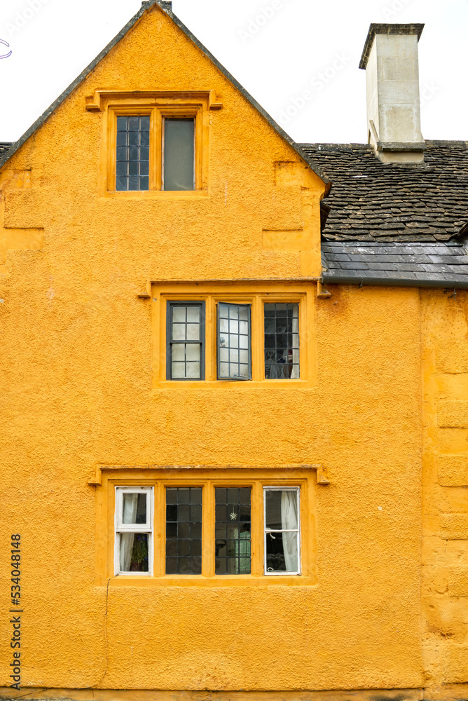 British town architecture. Simple middle-class building. The urban village of Corsham UK. Townhouse facade. British town architecture. Simple middle-class building. The urban village of Corsham UK. Townhouse facade.