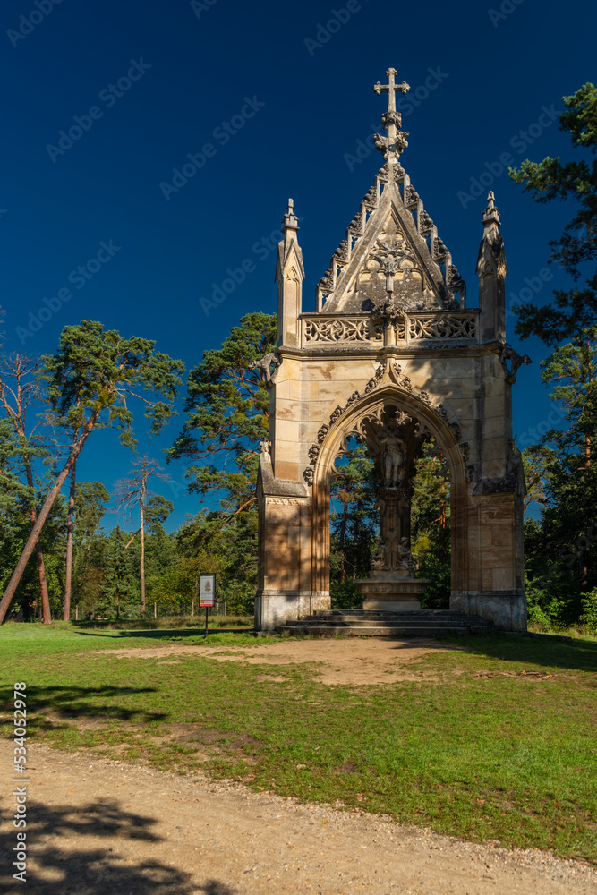 Temples in green forests near Lednice and Valtice towns in summer day