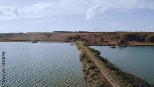 Wallpaper Mural Motorcyclist rides cross-country motorcycle, aerial photography of a moving motorcyclist at sunset Torontodigital.ca