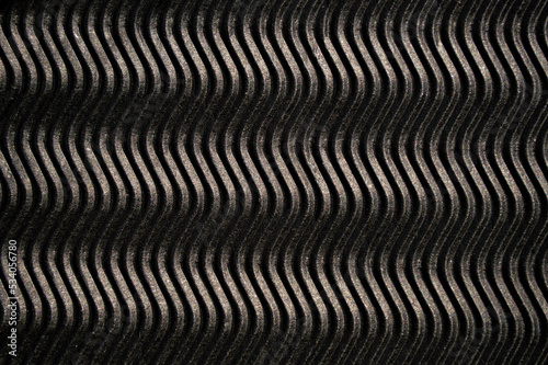 Background with corrugated cardboard in black. Texture of cardboard.