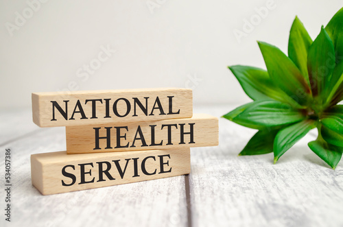 Text NHS National Health Service on a white background.