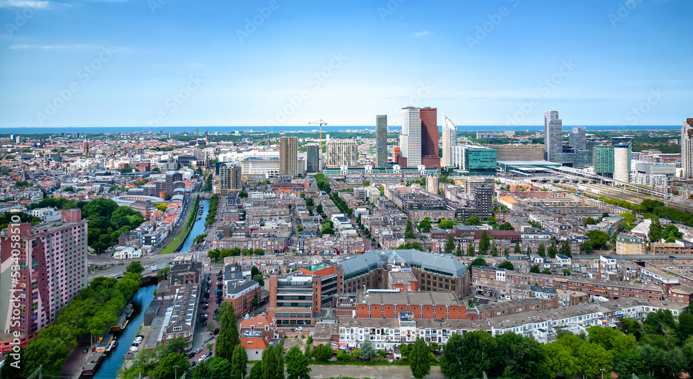Fototapeta premium City aerial view of The Hague city center with North Sea on the horizon
