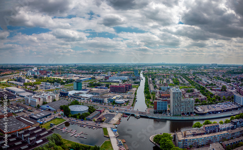 City aerial view of The Hague city center with North Sea on the horizon