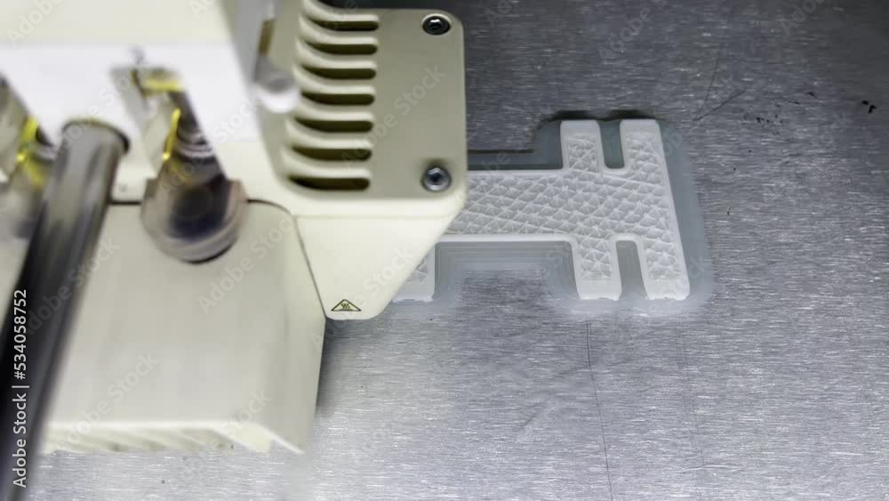 Close up of 3d Printer printing Close up of 3d Printer printing
