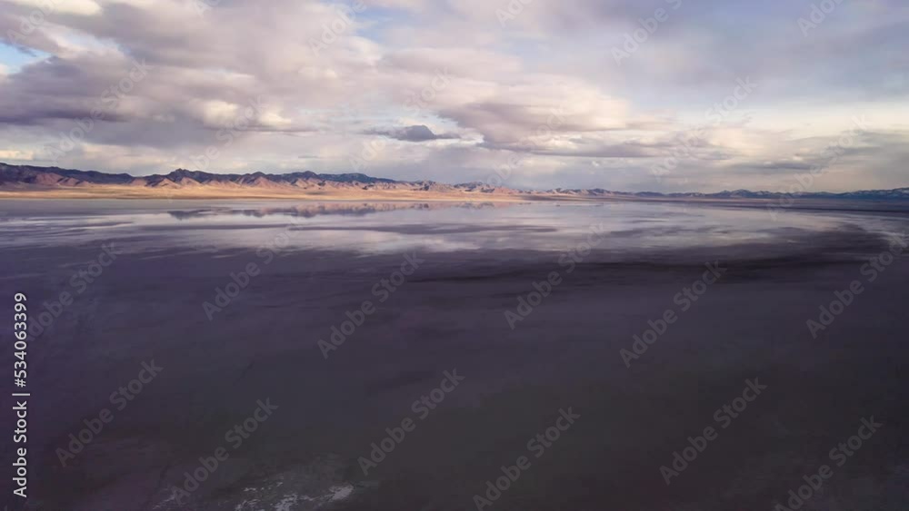 Reflecting sunset flying dji over salt flat Reflecting sunset flying dji over salt flat