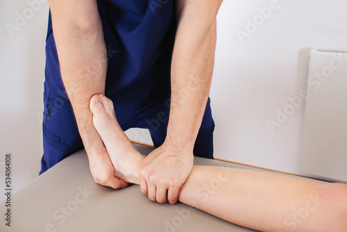 Physiotherapy leg pain exercises. Body massage in spa. Rehabilitation center. Professional medical services Foot therapy background. Feet massage health care.