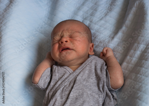 newborn baby sneezing