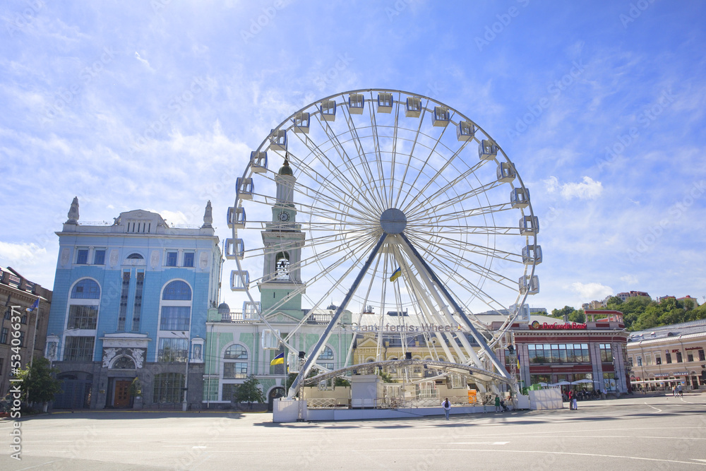 Ferris wheel on the Kontraktova Square on Podol in Kyiv, Ukraine