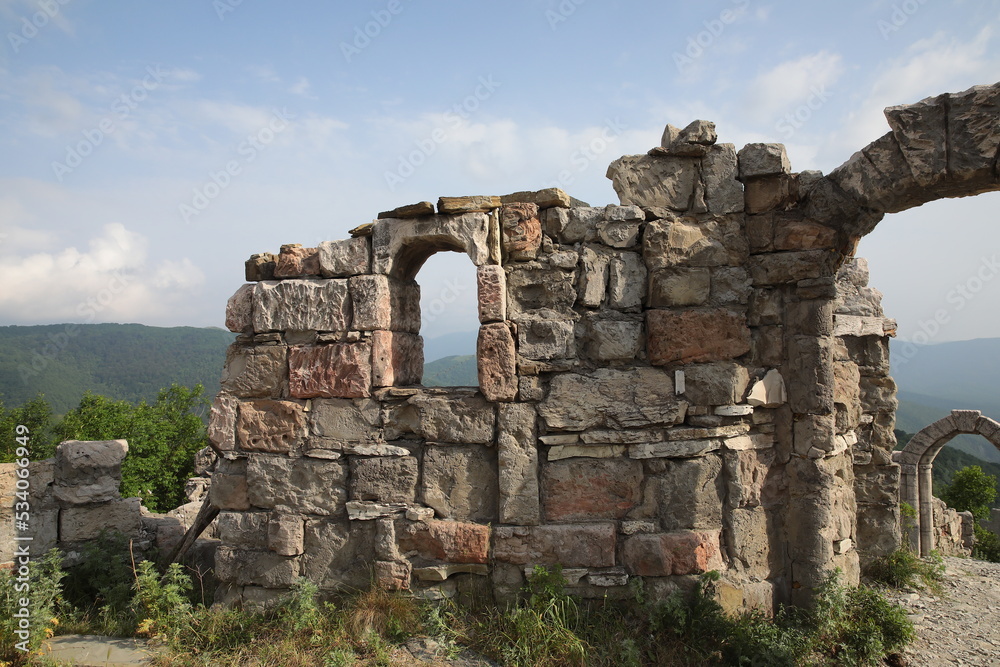Ruins of a city destroyed by time high in the mountains.Remains of an ancient building outdoors