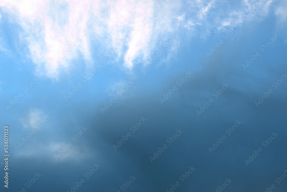 White and dark clouds float towards each other across the blue sky, on the monitor Background Banner Screensaver. White and dark clouds float towards each other across the blue sky, on the monitor Background Banner Screensaver.