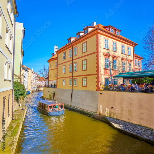 Photography The tourist boat sails along Certovka Canal in Mala Strana district in Prague, C