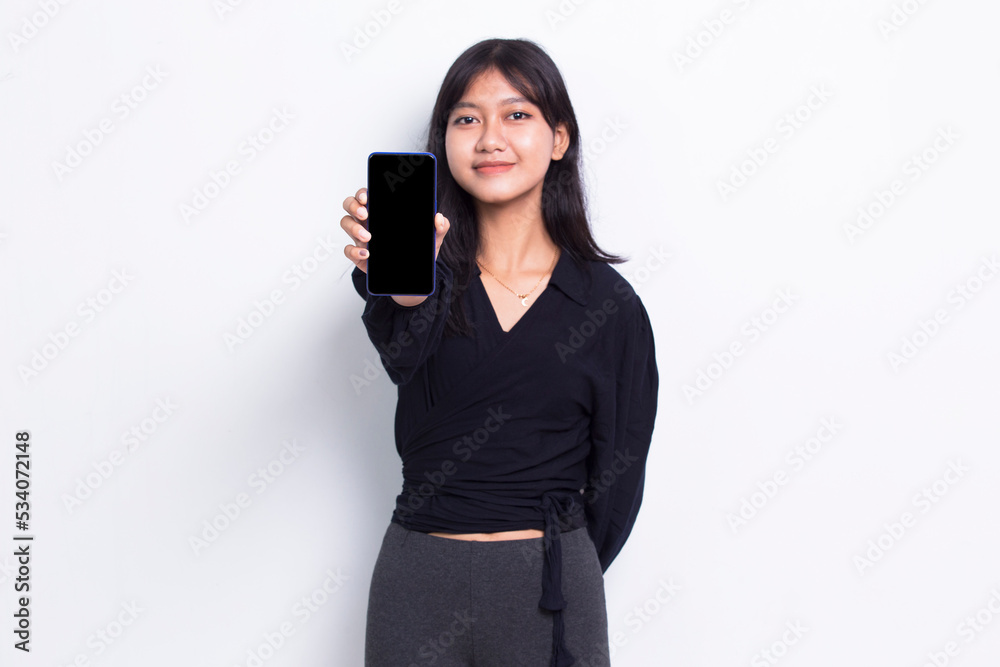 young beautiful asian cute woman demonstrating mobile cell phone isolated on white background
young beautiful asian cute woman demonstrating mobile cell phone isolated on white background