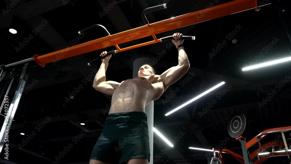 pullup. strong man practicing pullup in sport gym. man do pullup ...