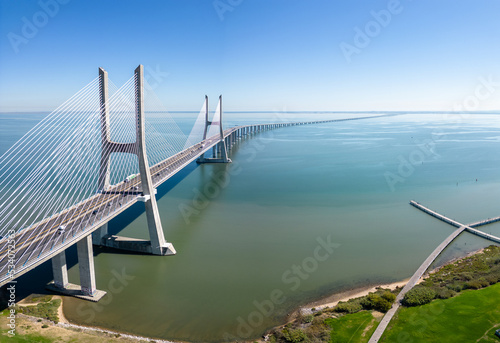 Aerial footage Vasco da Gama bridge at Park of The Nations in Lisbon (Parque das Nações)