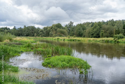 view of the Warta river in the town of Konopnica, Łódź Province, Poland