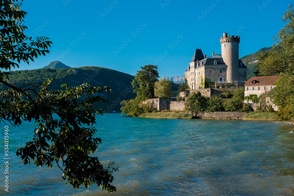 Annecy, france - september 2022: Château de Duingt at one end of the lake, beautiful medieval castle. Annecy, france - september 2022: Château de Duingt at one end of the lake, beautiful medieval castle.