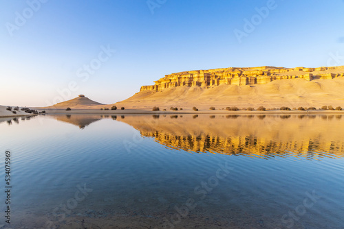 Obraz na płótnie Reflections in Qarun Lake in the desert at Faiyum Oasis. w salonie