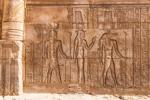 Carved mural featuring the crocodile god Sobek at the Kom Ombo temple. photo