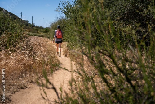 Hikers walking to the lake of Hodges in San Diego California photo