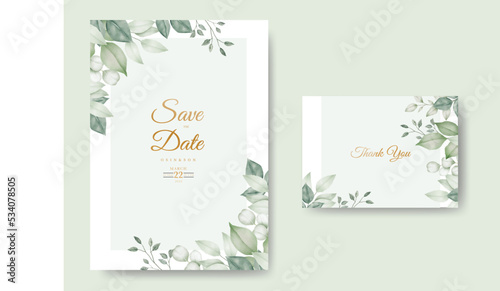 Watercolor wedding invitation card in green leaves 