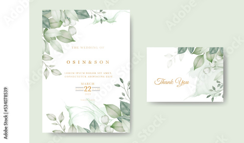 Watercolor wedding invitation card in green leaves 