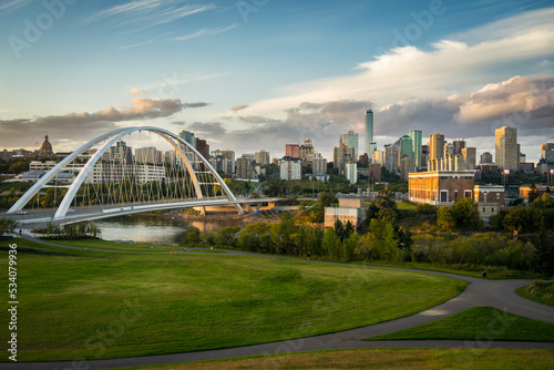 Edmonton, Alberta, Canada skyline at dusk with suspension bridge 