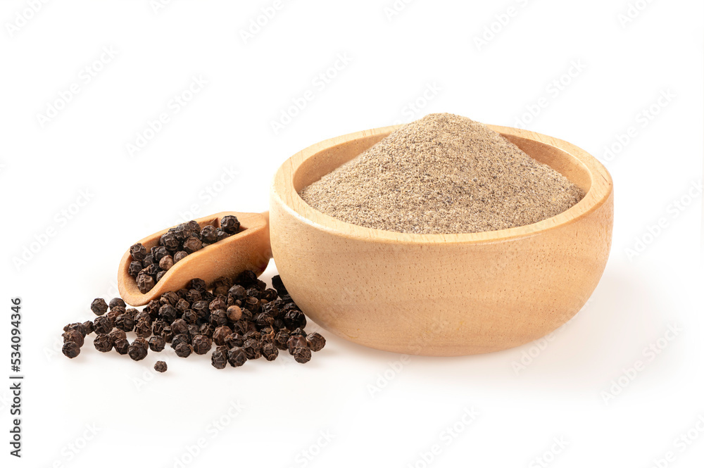 Close up Ground pepper in wooden bowl with black pepper isolated on white background. Close up Ground pepper in wooden bowl with black pepper isolated on white background.